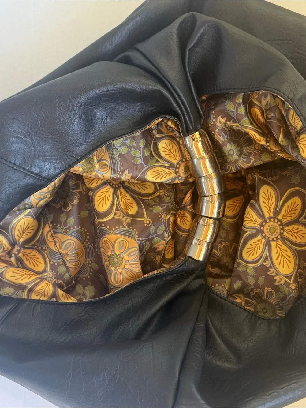 Black Leather Hobo Bag with Patterned Trim